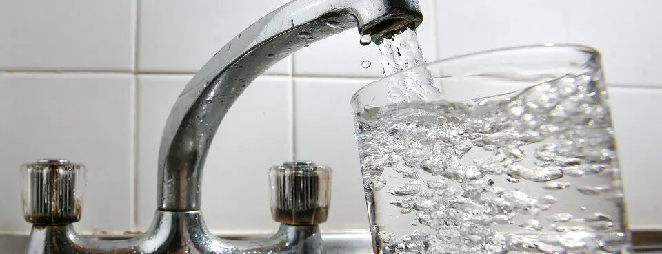 faucet filling water glass
