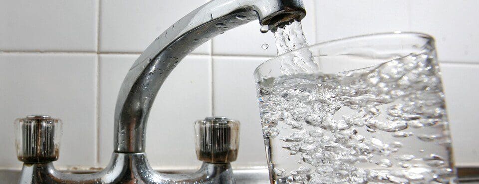faucet filling water glass
